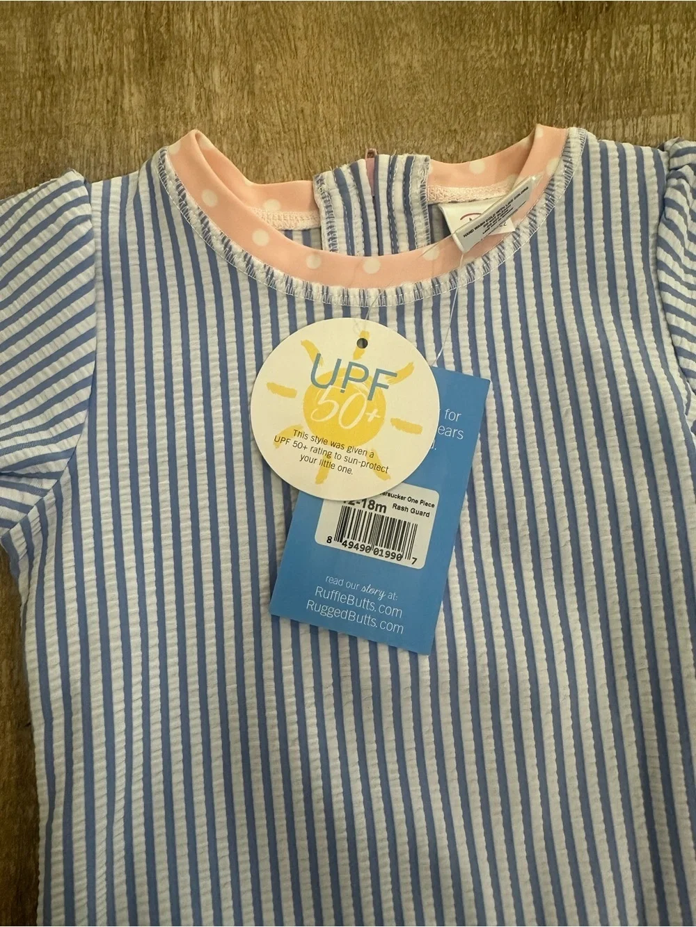 RuffleButts Blue Seersucker Rash Guard One Piece | 12–18M | UPF 50+